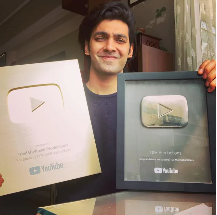 Anmol Jamwal with YouTube silver and golden play button