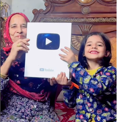 Shaad Malik with YouTube silver play button